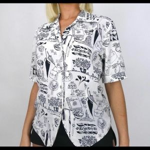 1980’s newspaper print Brand Jordan, black and white print short sleeve blouse.